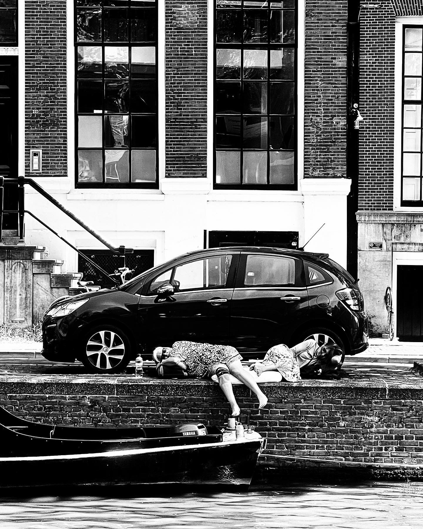 When you just have to take a nap in the summer heat of Amsterdam#smlp #amsterdam #takinganap #stoned #summer #cannal #blackandwhite #shotoniphone #iphonography